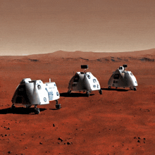 a row of small white vehicles on a red surface with the letters lm on the front