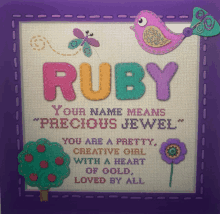 the name ruby is on a purple card with a bird