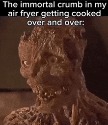 a picture of a monster with the caption " the immortal crumb in my air fryer getting cooked over and over "