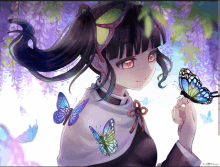 a girl with a ponytail is holding a blue and green butterfly in her hand