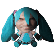 a stuffed toy with a man 's face and blue hair