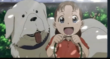 a girl is holding a leash next to a white dog .
