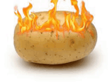 a potato with fire coming out of it on a white background .