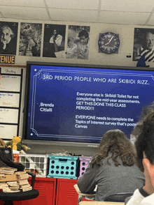 a screen in a classroom that says 3rd period people who are skibidi rizz on it