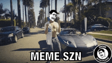 a shirtless man stands in front of a car that says meme szn on it