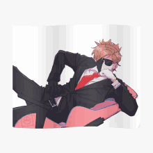 a man in a suit and tie is laying down on a pink chair