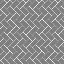 a herringbone pattern of gray tiles with white lines