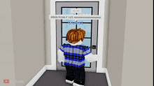 a boy in a plaid shirt is standing in front of a door that says noob on it