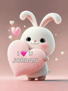 a stuffed bunny holding a heart that says i love u jordan