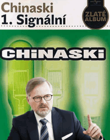 a man in a suit and tie is pointing at a light bulb on the cover of a book titled chinaski