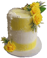 a yellow and white cake with yellow roses and sprinkles