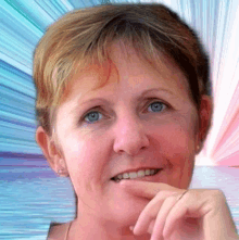 a close up of a woman 's face with a colorful background