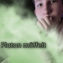 a picture of a young man with the name platon muffelt on it