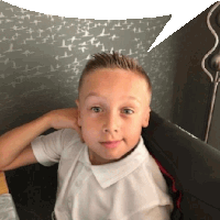 a young boy in a white shirt with a speech bubble in the background