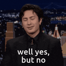 a man in a suit and tie is smiling and says well yes but no
