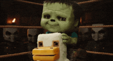 a green monster is holding a stuffed duck