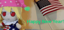 a stuffed doll is sitting next to a small american flag and the words happy new year