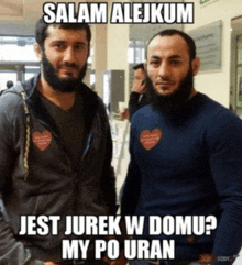 two bearded men are standing next to each other with the caption salam alejkum jest jurek w domu my po uran