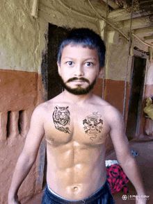 a boy with a tattoo of a tiger on his chest