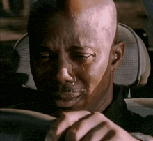 a man with tears running down his face