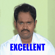 a man wearing a white shirt with the word excellent on it