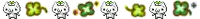 a blurry picture of a row of skulls with green eyes .