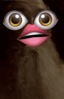 a close up of a cartoon face with big eyes and a pink mouth