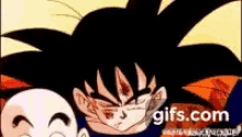 a close up of a cartoon character 's face with the words `` gifs.com '' on the bottom .