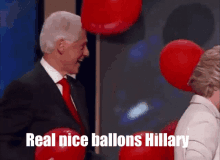 a man in a suit and tie stands next to a woman holding red balloons with the words real nice ballons hillary below him