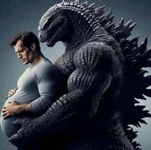 a pregnant man is being held by a giant monster