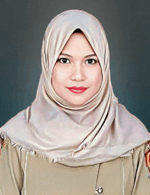 a woman wearing a hijab and a tan shirt with a badge on the sleeve