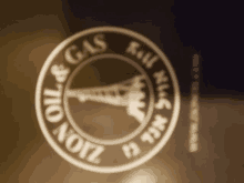 a circle with the words oil and gas in the center