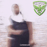 a blurry picture of a woman holding a microphone in front of a safuu logo .