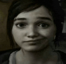 a close up of a woman 's face with a slight smile on her face