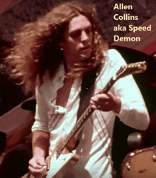 a man with long hair is playing a guitar with the name allen collins aka spee demon written above him