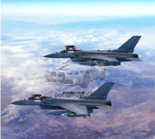 two fighter jets are flying in the sky with a car behind them
