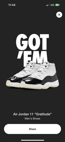 a phone screen shows a pair of air jordan 11 sneakers