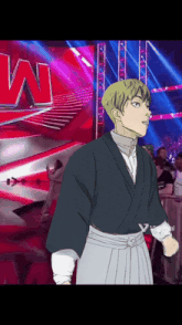 a man in a kimono is standing in front of a wwe logo