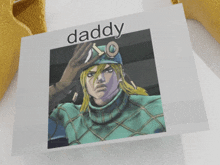 a card with a picture of a man and the word daddy on it