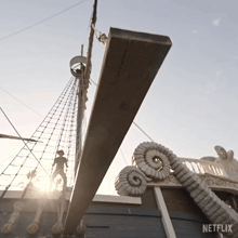 a netflix logo can be seen on the back of a ship
