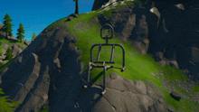 a drawing of a skeleton is on a rocky cliff