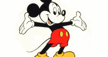 a cartoon drawing of mickey mouse with red shorts and yellow shoes