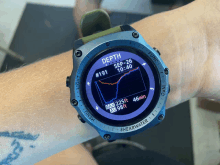 a person is wearing a watch that says depth on the face