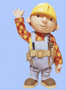 bob the builder is wearing overalls and a hard hat and waving his hand