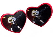 a pair of heart shaped sunglasses with kat written on the lenses