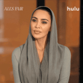 a woman wearing a head scarf says no on a hulu ad