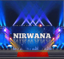 a stage with a red carpet and the words nirvana on it