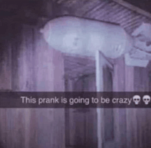 a picture of a room with a balloon hanging from the ceiling and a skull on the wall .