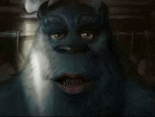 a painting of a monster with horns and teeth
