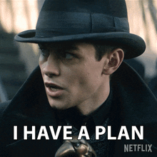 a man wearing a hat says i have a plan